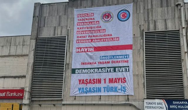 Türk-İş Gar binasına 1 Mayıs afişi astı